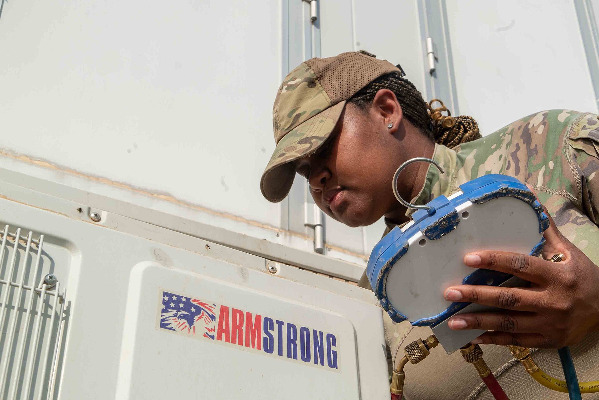 HVAC engineer carrying out technical work on mechanical equipment